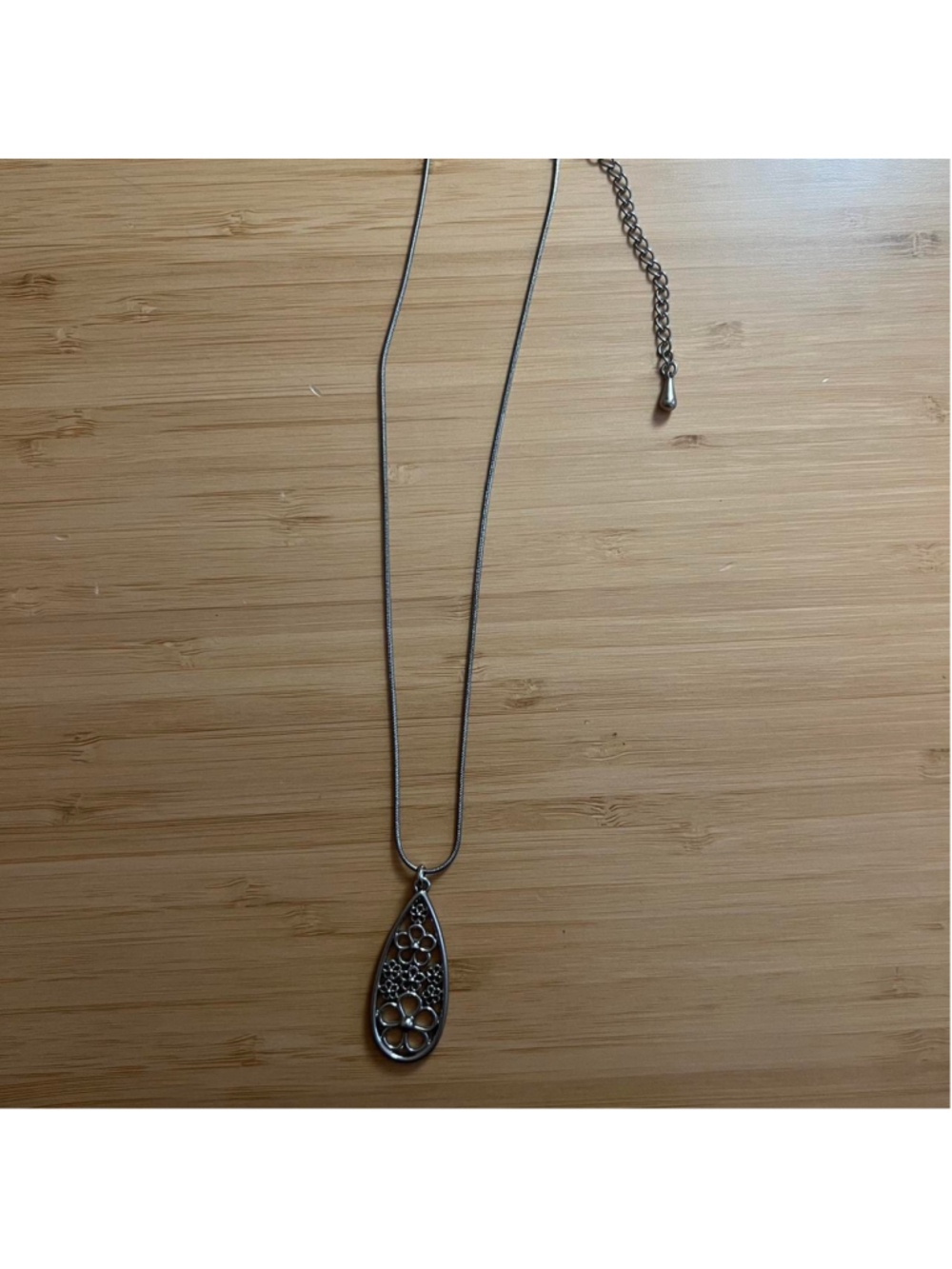 Lia Sophia silver necklace with flower design pendant